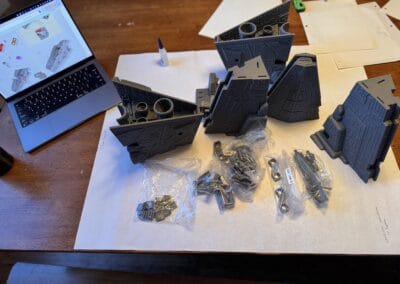 LEGO Star Wars building set with instruction on laptop screen.
